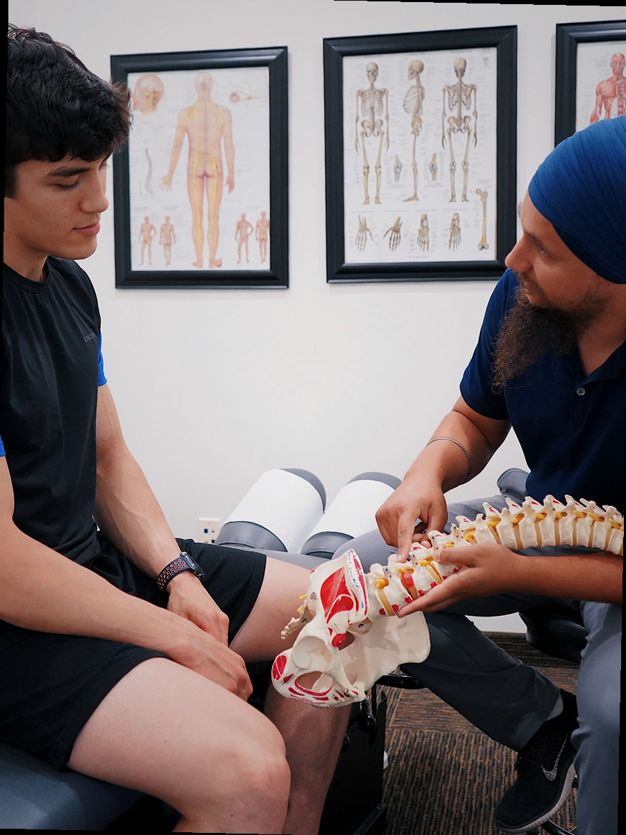 Healthcare professional explaining a lumbar disc herniation