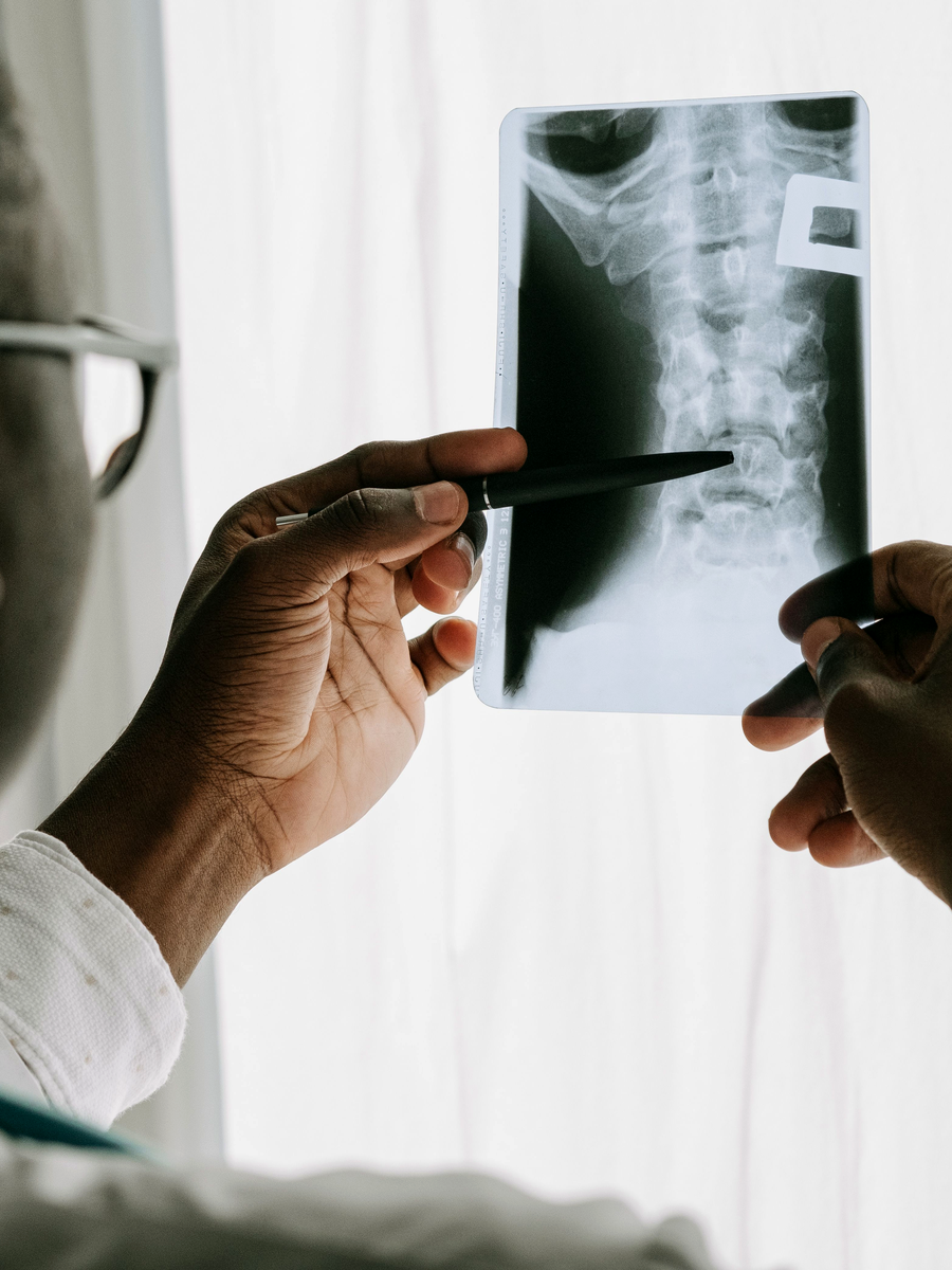Imaging review and shared decision-making related to motorized spinal decompression vs surgery