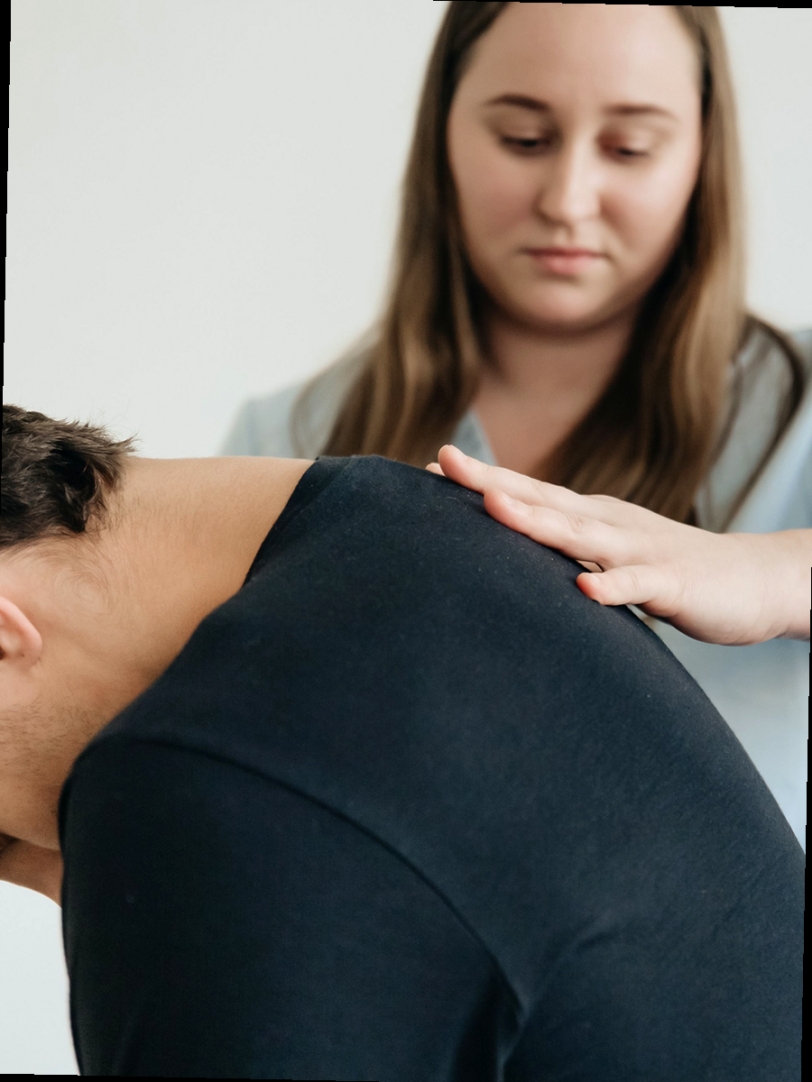 Patient reviewing educational resources about spine health